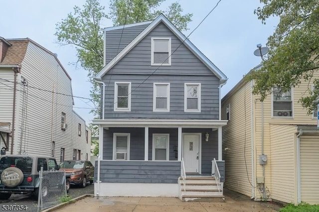 16 New St, Montclair Twp, NJ 07042 - american foursquare style home featuring a porch