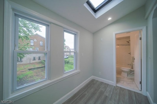 16 New St, Montclair Twp, NJ 07042 - empty room featuring a skylight, lofted ceiling, and recessed lighting