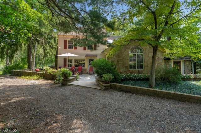 view of front facade featuring a patio area