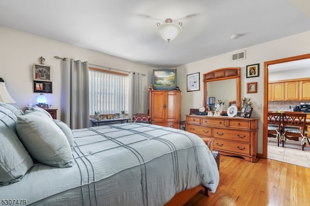 bedroom featuring light hardwood / wood-style floors