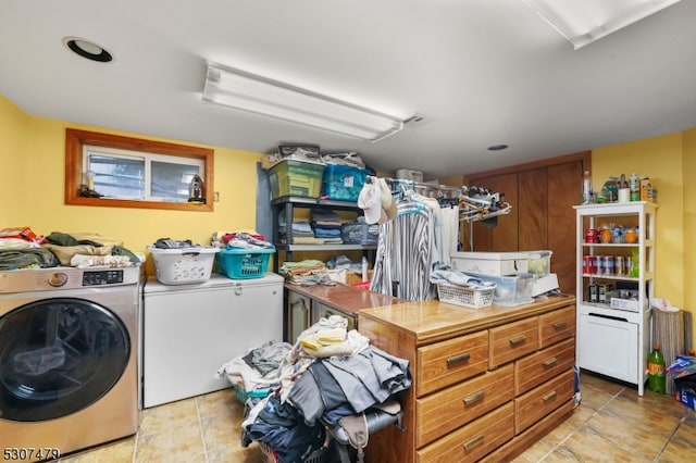 washroom with light tile patterned flooring and washer / clothes dryer