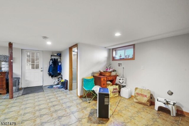 basement with tile patterned flooring