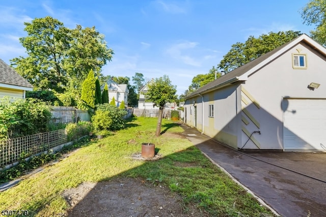 view of yard with a garage