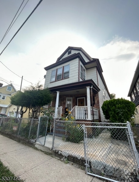 view of front of home featuring covered porch