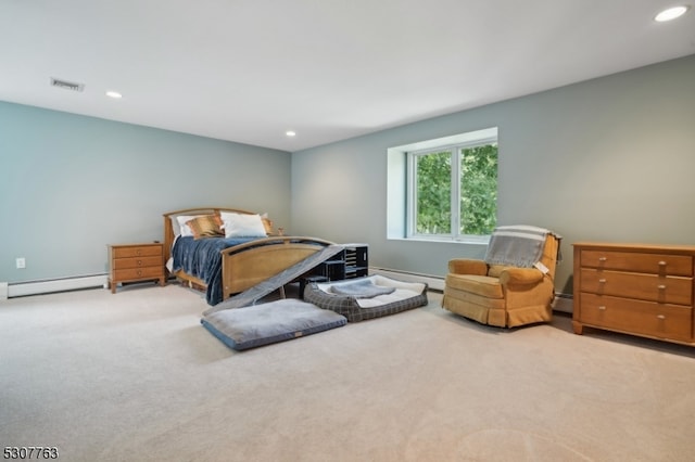 bedroom with light colored carpet and baseboard heating