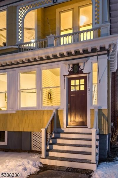 entrance to property with a balcony