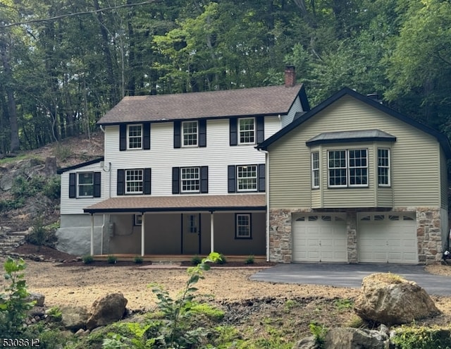 view of front of property featuring a garage