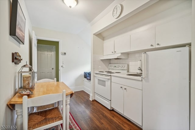 kitchen with tasteful backsplash, sink, white cabinetry, white appliances, and dark hardwood / wood-style flooring