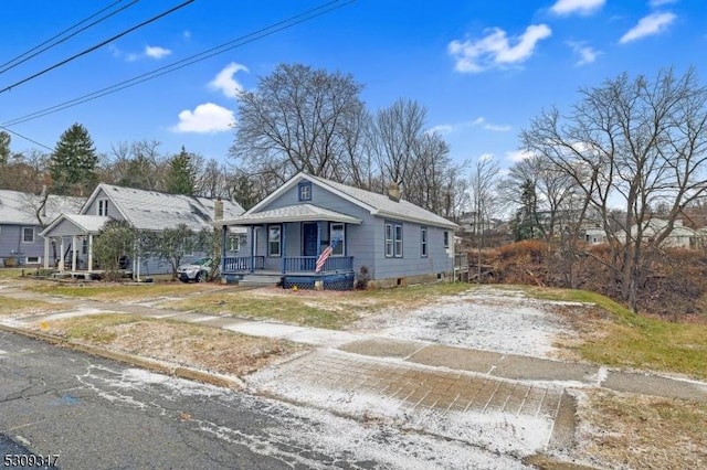 bungalow-style house with covered porch