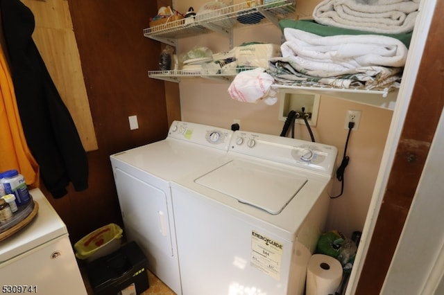 laundry room with washer and dryer