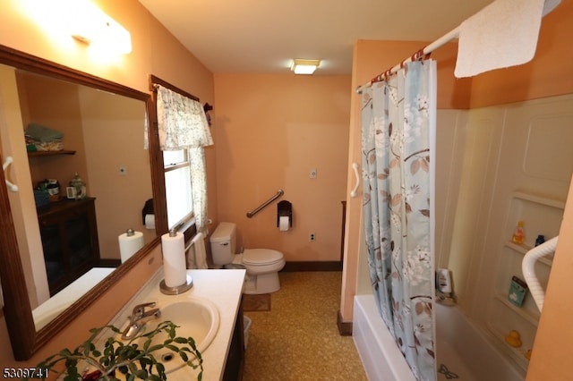 full bathroom with vanity, toilet, and shower / tub combo with curtain