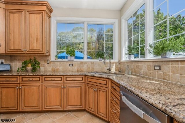 interior space with stainless steel appliances, light tile patterned flooring, and tasteful backsplash