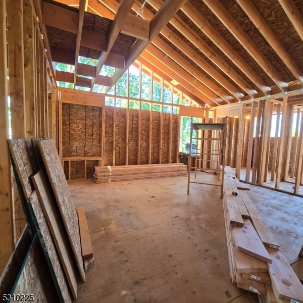 misc room with vaulted ceiling