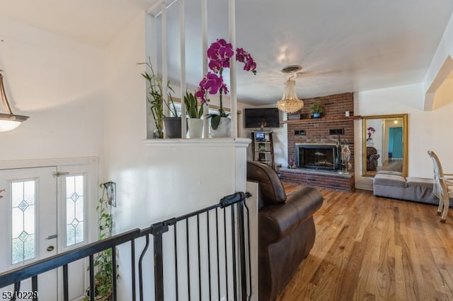 living room with a fireplace and hardwood / wood-style floors