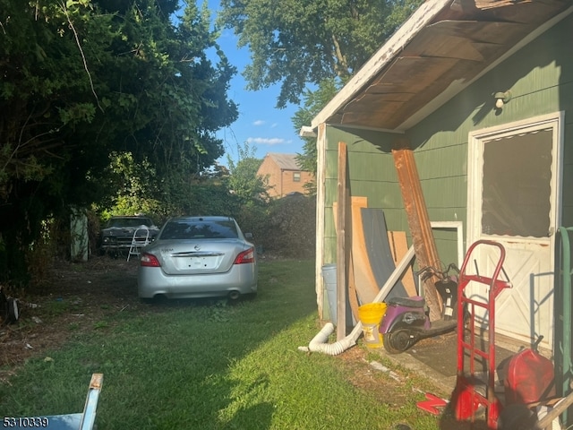 view of property exterior with a yard