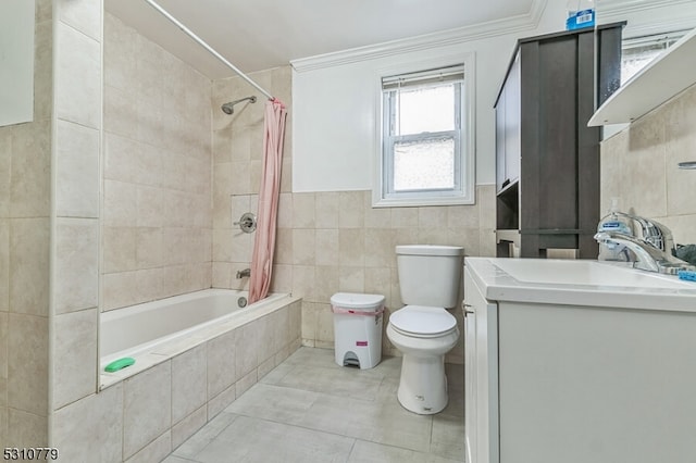 full bathroom featuring tile patterned flooring, vanity, tile walls, and shower / bath combo with shower curtain