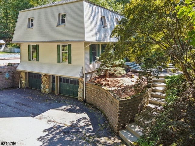 exterior space featuring a garage