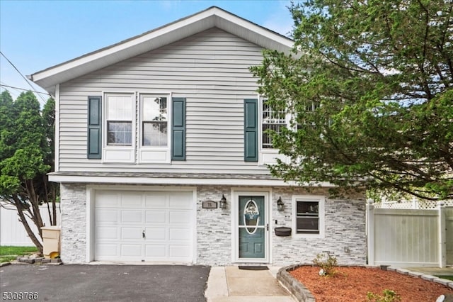 view of front of property with a garage