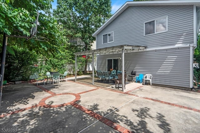 back of house with a patio and a pergola