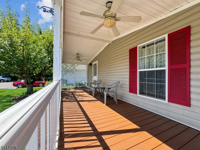 wooden terrace with ceiling fan