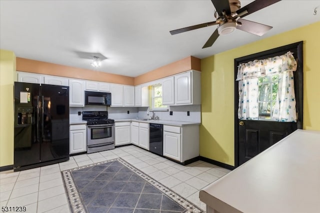 kitchen featuring white cabinets, black appliances, and ceiling fan