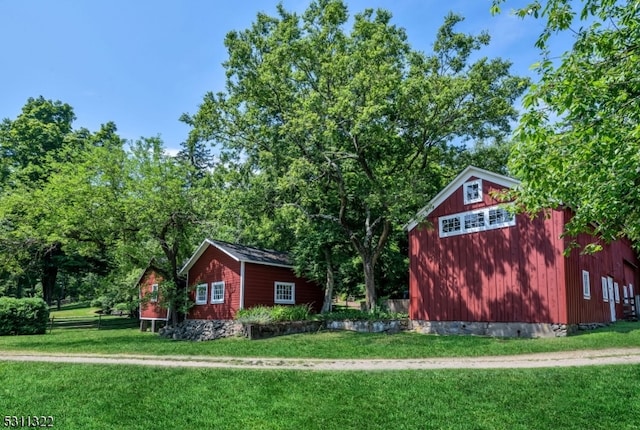 exterior space featuring an outbuilding