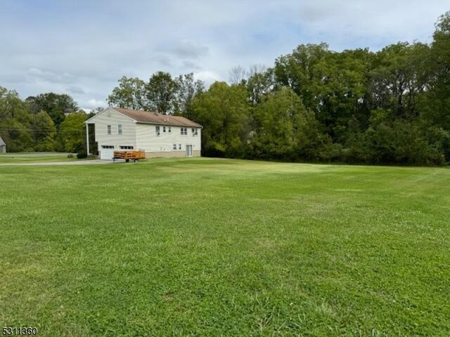 view of yard with a garage