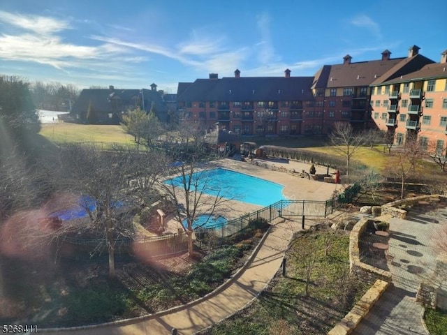 pool with a patio area