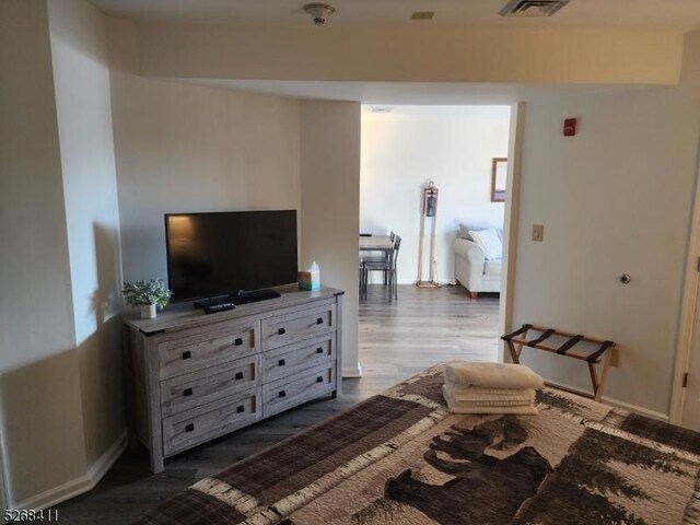 bedroom featuring hardwood / wood-style floors