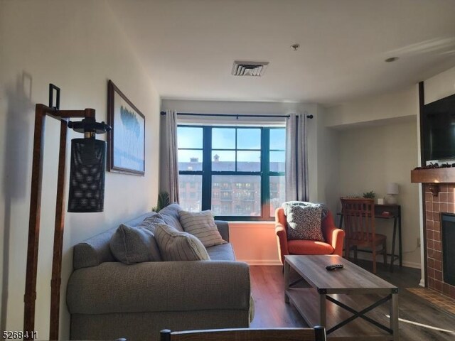 living room featuring dark hardwood / wood-style floors