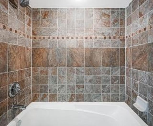 bathroom featuring bathtub / shower combination