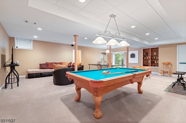 recreation room with billiards, light colored carpet, and a drop ceiling