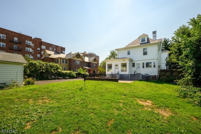 exterior space with a yard and a patio area