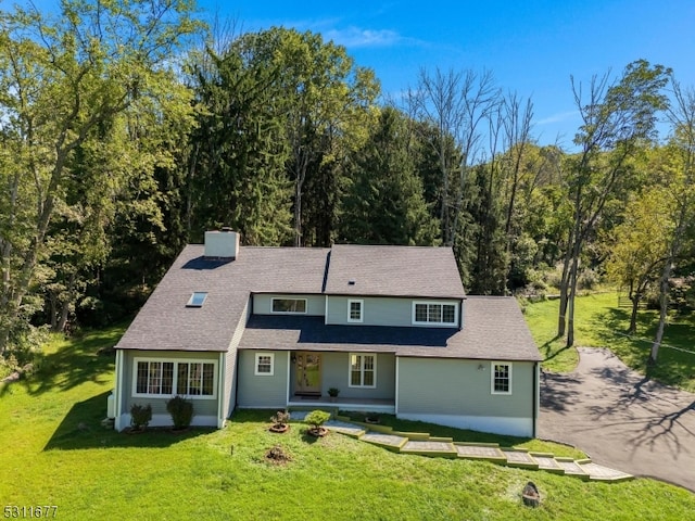 view of front of home with a front yard