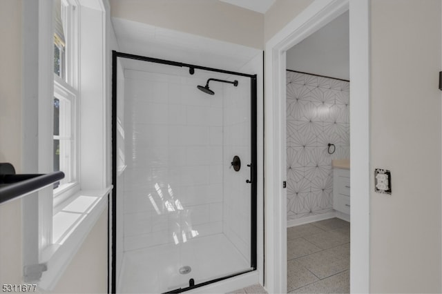 bathroom with vanity and an enclosed shower