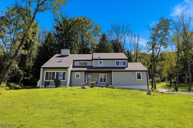 view of front of home with a front yard