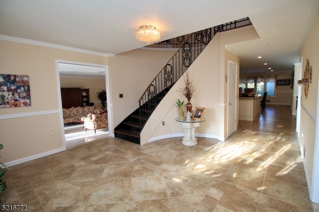 stairs featuring crown molding