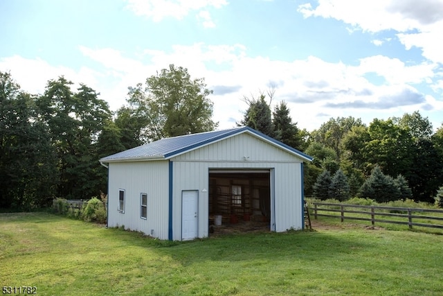 view of outdoor structure featuring a yard