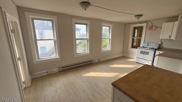 kitchen with light hardwood / wood-style flooring, white range, a baseboard radiator, and white cabinetry