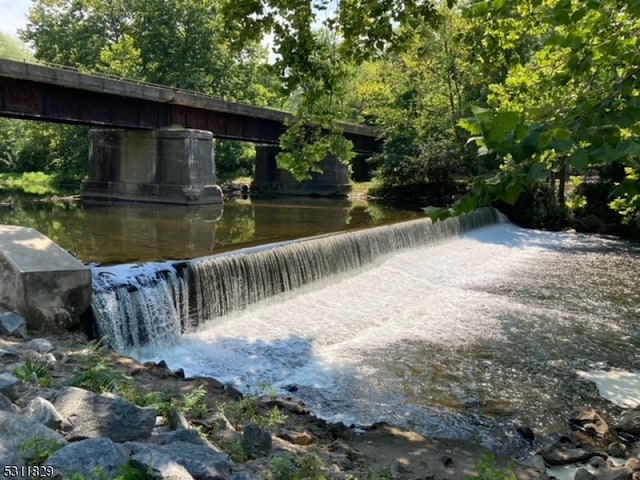 view of community with a water view