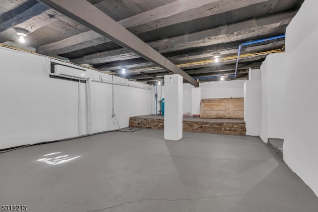 basement with a wall unit AC