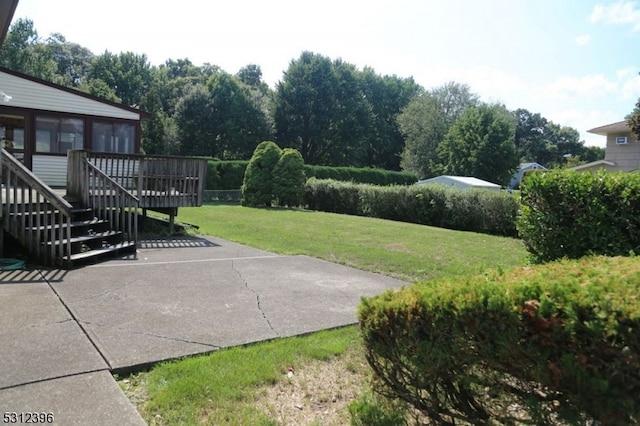 view of yard with a deck