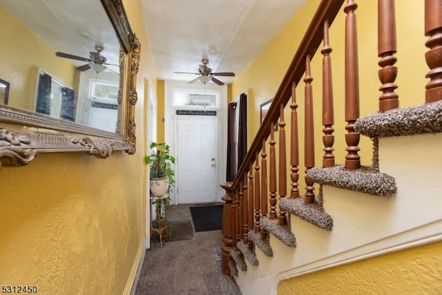 interior space featuring ceiling fan