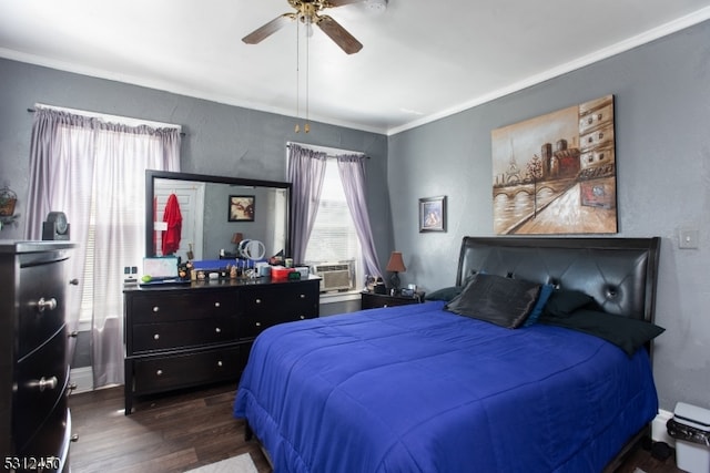 bedroom featuring ceiling fan, dark hardwood / wood-style flooring, cooling unit, and ornamental molding