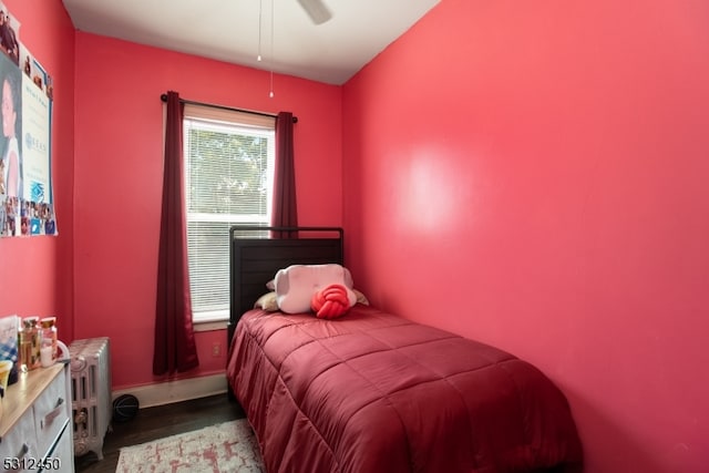 bedroom featuring light hardwood / wood-style flooring and ceiling fan