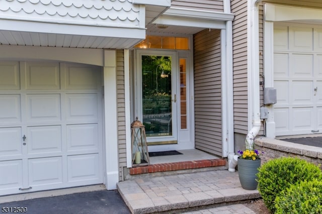 property entrance featuring a garage