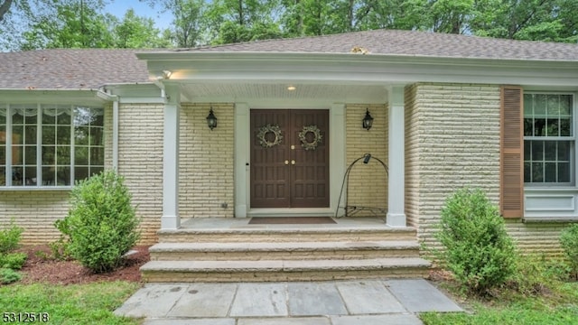 entrance to property with a porch