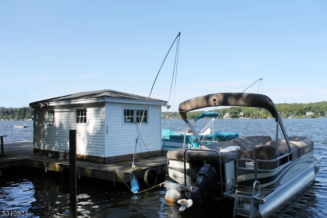 dock area featuring a water view