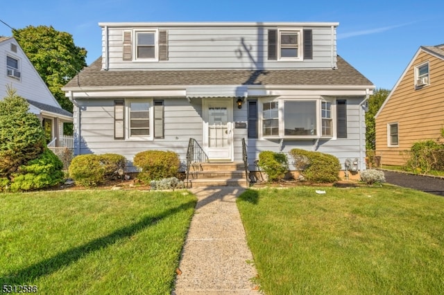 view of front of house featuring a front lawn