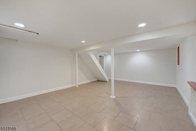 basement with light tile patterned floors